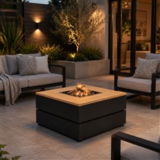 The black CosiPure 100 Fire Table in a patio setting
