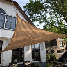 Triangular shade sail in the garden